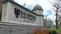 photo of the entrance to Dalhousie University with the name plate on concrete gates.